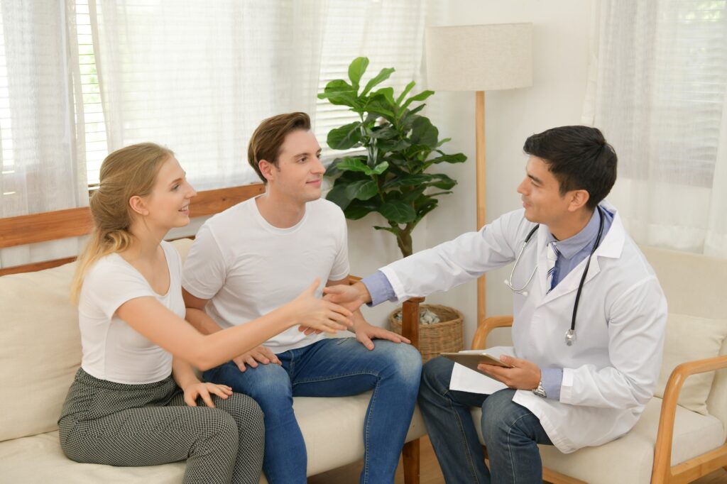 Love couple having infertility problems need advisor with the doctor.